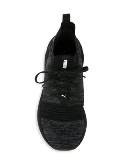 Shop Puma Ignite Limitless Evoknit Sneakers In Black