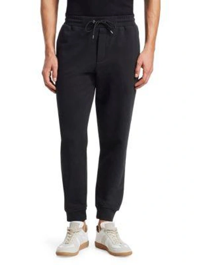 Shop Mcq By Alexander Mcqueen Embroidered Lined Cotton Track Pants In Black