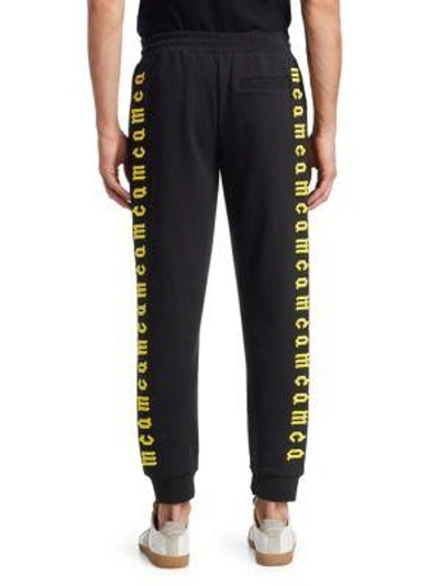 Shop Mcq By Alexander Mcqueen Embroidered Lined Cotton Track Pants In Black
