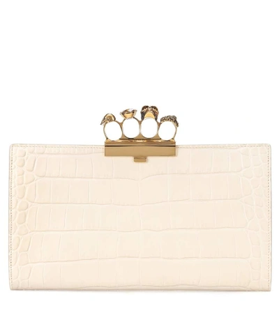 Shop Alexander Mcqueen Skull Four-ring Leather Clutch In White