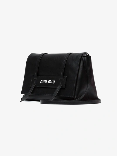 Shop Miu Miu Black Logo Embossed Leather Shoulder Bag