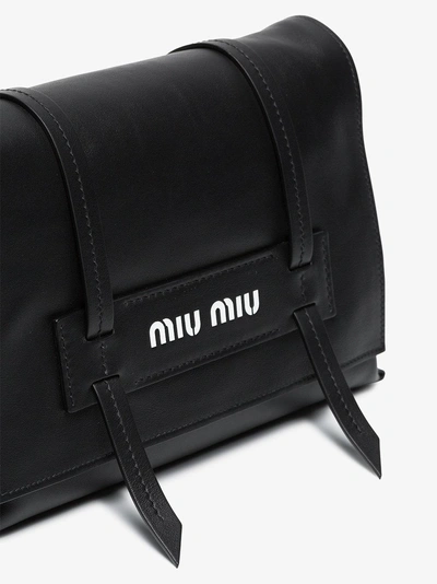 Shop Miu Miu Black Logo Embossed Leather Shoulder Bag