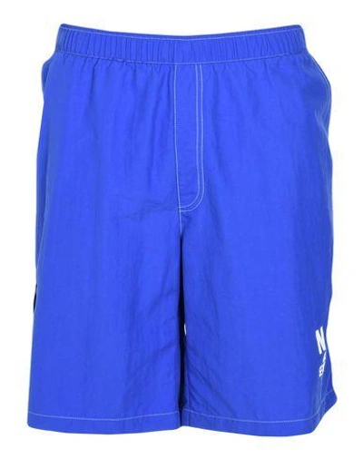 Shop Nike Swim Trunks In Blue