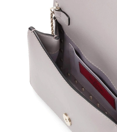 Shop Valentino Garavani Rockstud Leather Clutch