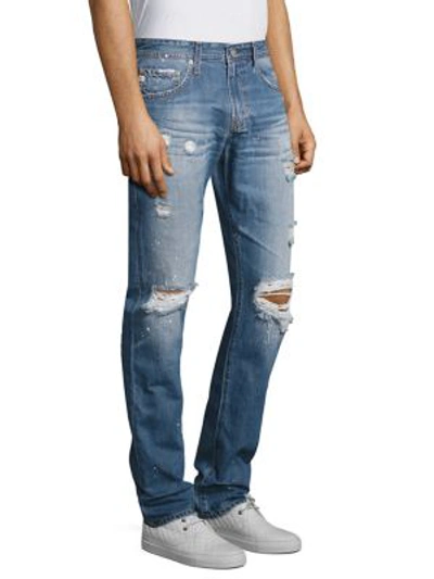 Shop Ag Tellis Modern Slim-fit Distressed Jeans In 22 Years