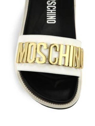 Shop Moschino Logo Leather Slides In Black