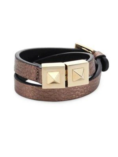 Shop Valentino Garavani Two-stud Metallic Leather Wrap Bracelet In Gold-brown
