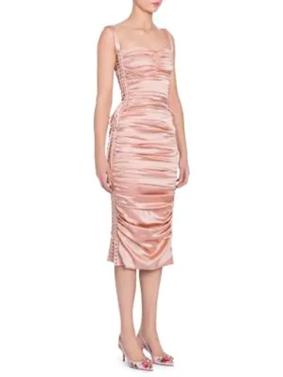 Shop Dolce & Gabbana Ruched Satin Lace-up Dress In Peach