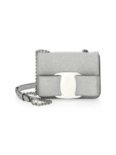 Shop Ferragamo Mini Vara Bow Glitter Leather Crossbody Bag In Silver