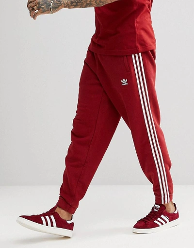 Shop Adidas Originals Adicolor 3-stripe Sweatpants In Red Cw2428 - Red