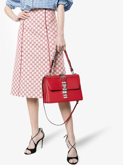 Shop Prada Red Studded Leather Shoulder Bag