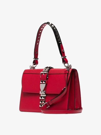 Shop Prada Red Studded Leather Shoulder Bag