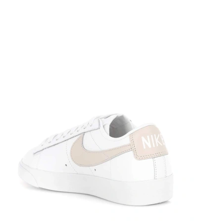 Shop Nike Blazer Low Le Leather Sneakers In White