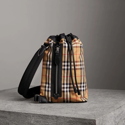Shop Burberry Small Vintage Check Canvas Duffle Bag In Antique Yellow