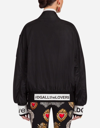 Shop Dolce & Gabbana Nylon Bomber Jacket In Black