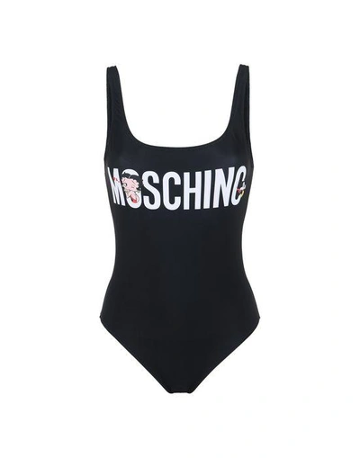 Shop Moschino One-piece Suits In Black