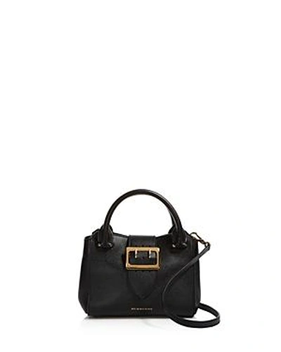 Shop Burberry Buckle Small Leather Satchel In Black/gold