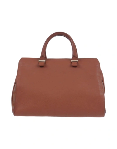 Shop Victoria Beckham Handbags In Brown