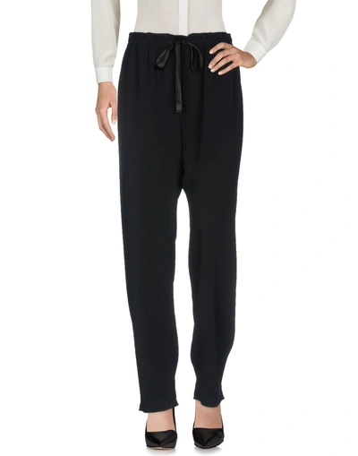Shop The Row Casual Pants In Black