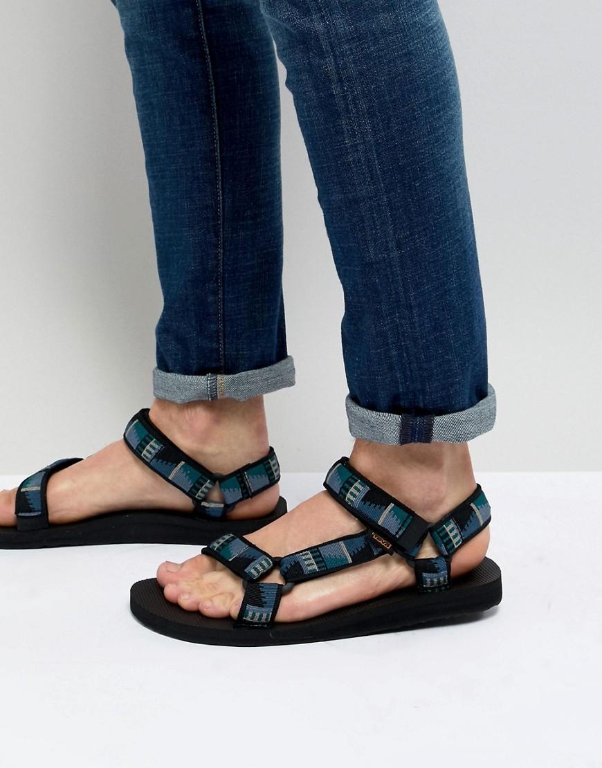 teva black original universal flat sandals