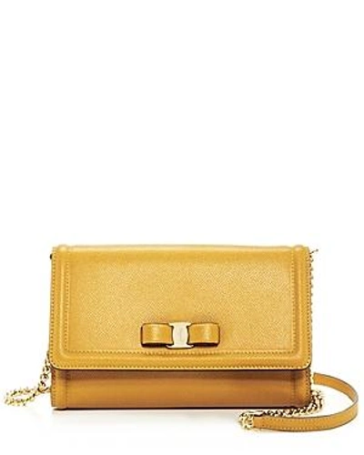 Shop Ferragamo Vara Bow Mini Bag In Mustard Yellow/gold