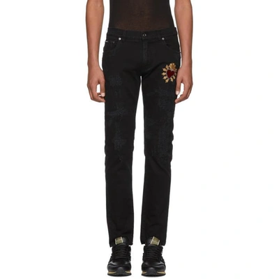 Shop Dolce & Gabbana Dolce And Gabbana Black Skinny Distressed Jeans In S9001 Black