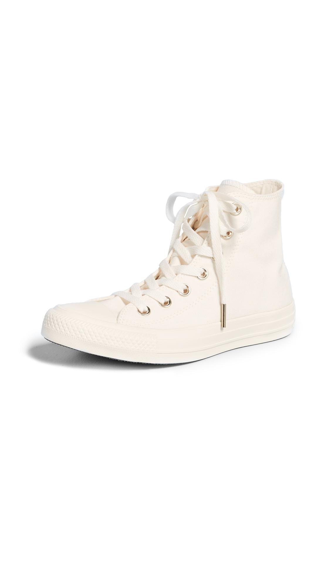 converse with gold eyelets