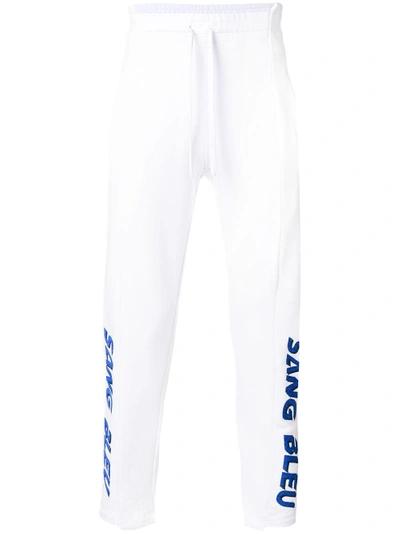 Shop Omc Sang Blue Sweatpants In White