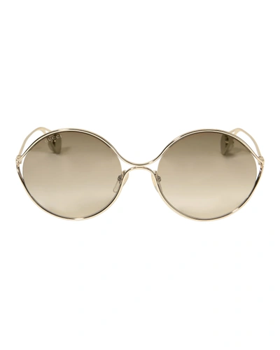 Shop Gucci Oval Metal Sunglasses In Gold