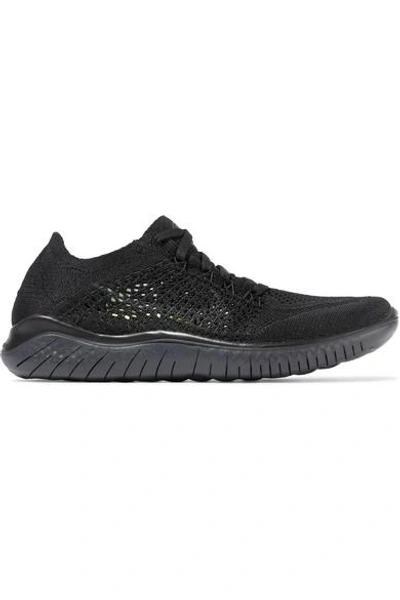 Shop Nike Free Rn Flyknit Sneakers In Black
