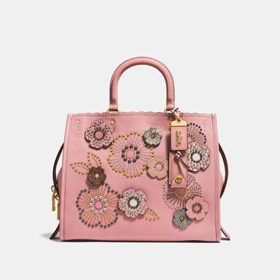 Shop Coach Rogue With Snakeskin Tea Rose Rivets In Peony/brass
