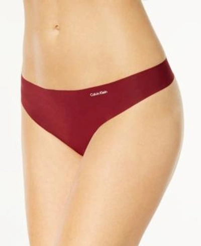 Shop Calvin Klein Invisibles Thong D3428 In Pure Cerulean