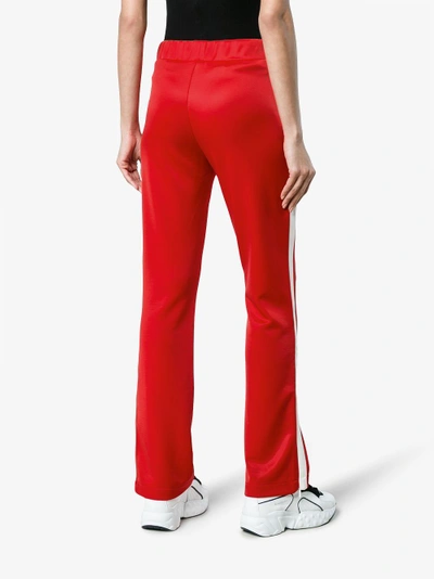 Shop Moncler Side Stripe Track Pants In Red