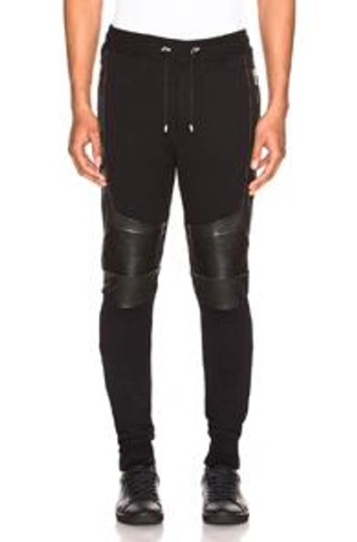 Shop Balmain Ribbed Moto Sweatpants With Leather Details In Black