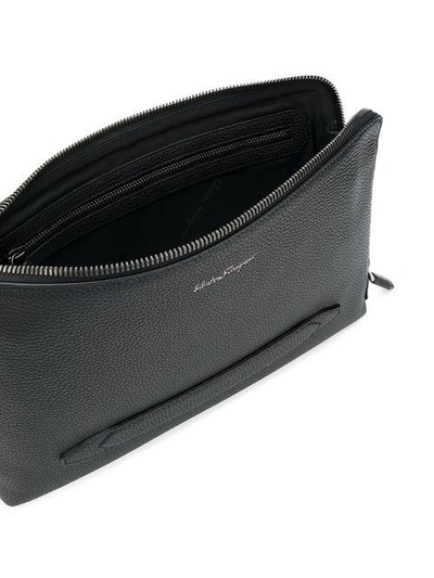 Shop Ferragamo Large Logo Clutch In Black