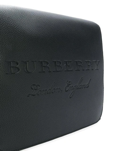 Shop Burberry Embossed Messenger Bag In Black
