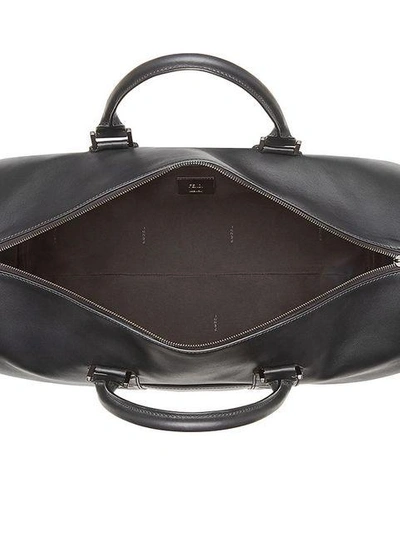 Shop Fendi Embossed Logo Duffel Bag In Black