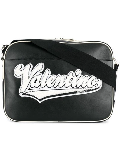 Shop Valentino Logo Patch Messenger Bag In Black
