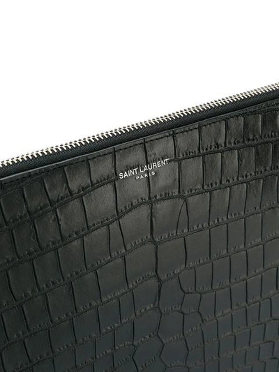 Shop Saint Laurent Monogram Zipped Clutch In Black