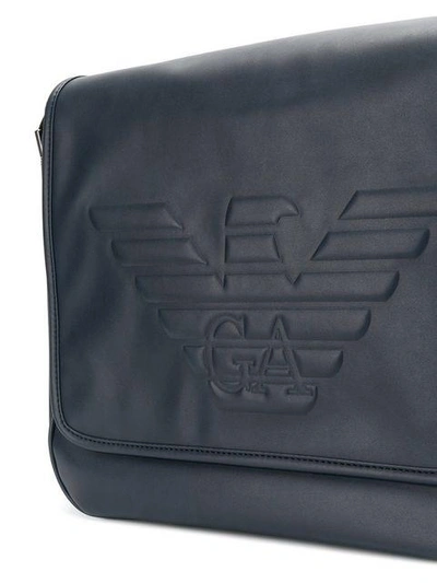 Shop Emporio Armani Logo Embossed Messenger Bag - Blue