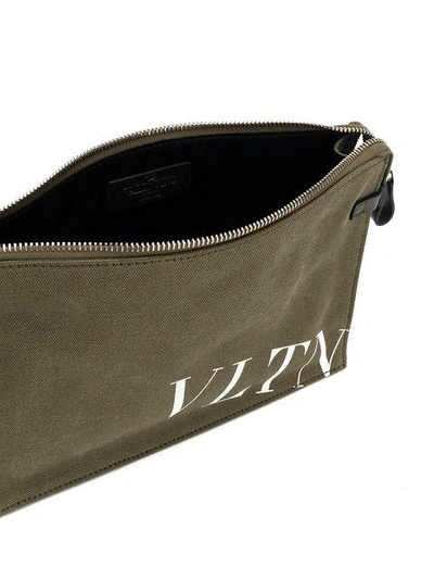 Shop Valentino Vltn Logo Clutch Pouch In Green