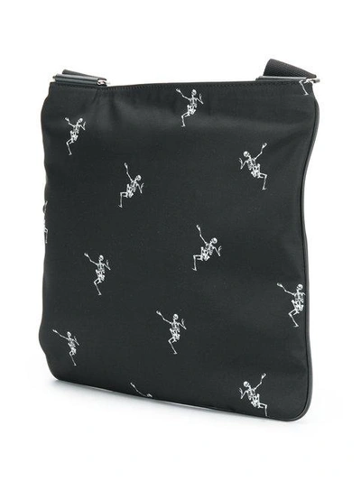 Shop Alexander Mcqueen Skeleton Print Messenger Bag In Black