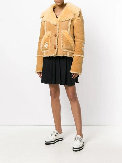 Shop Coach Eagle Raggedy Shearling Jacket In Toffee