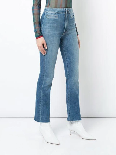 Shop Mother Back Tie Flared Jeans