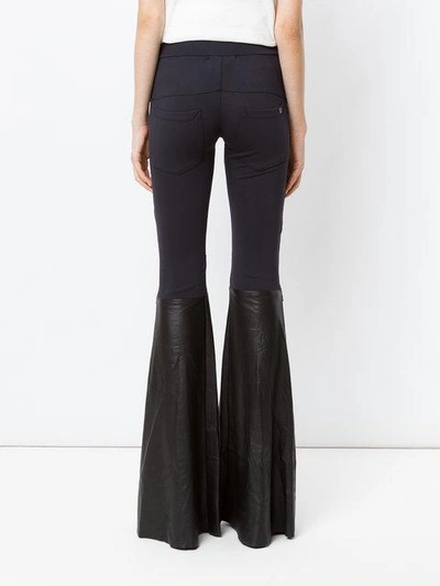 Shop Andrea Bogosian Panels Flared Trousers - Black