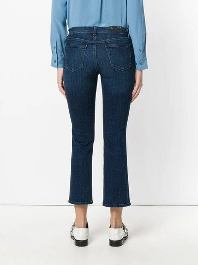 Shop J Brand Cropped Denim Jeans In Blue