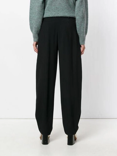 Shop Chloé Loose Fit Tapered Trousers In Black