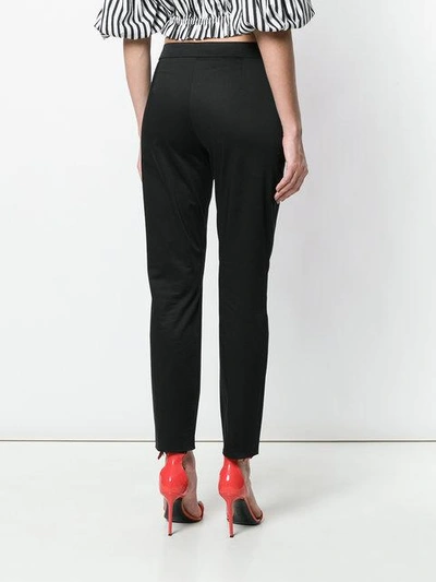 Shop Moschino Skinny Denim Trousers - Black