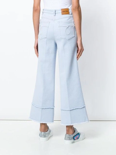 Shop Miu Miu Jeans Mit Weitem Bein - Blau In Blue