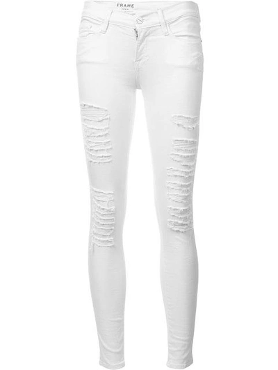 Shop Frame Distressed Skinny Cropped Jeans In White